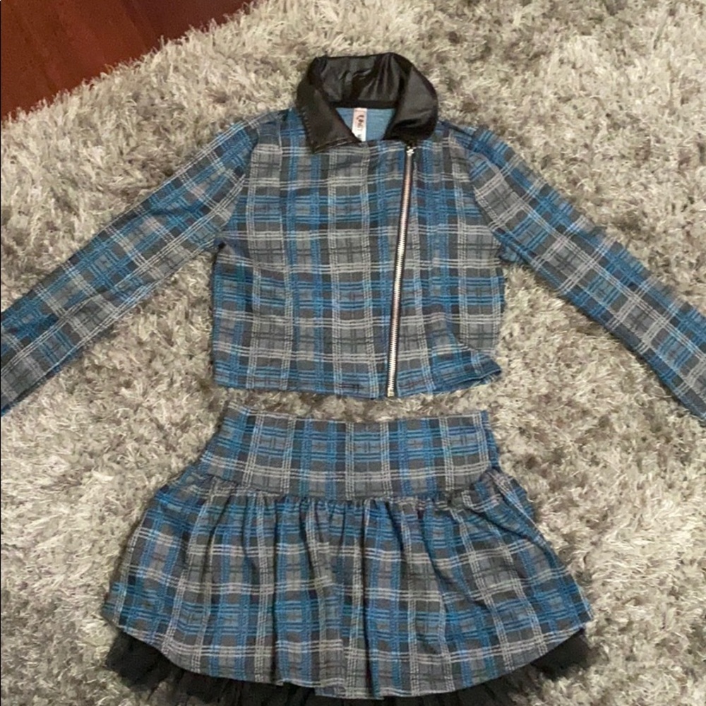 Two piece skirt, jacket and tank top